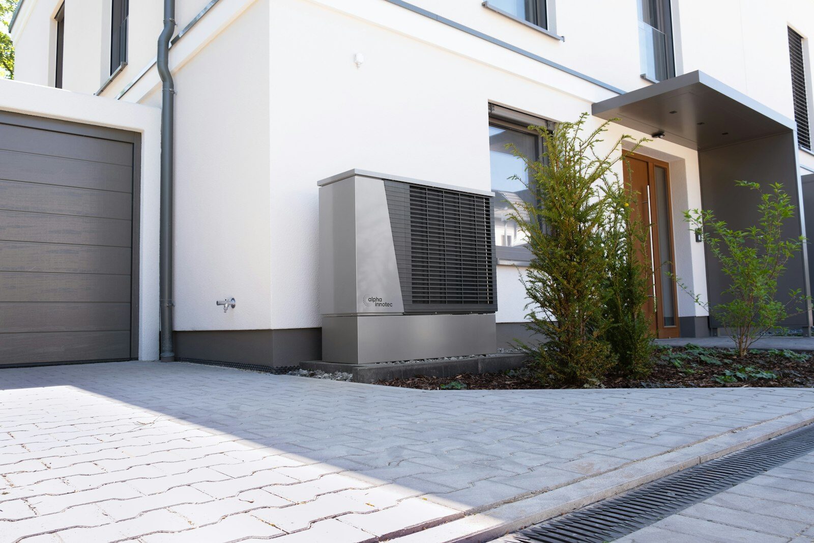 Air source heat pump installed at a Surrey home by Surrey Heating